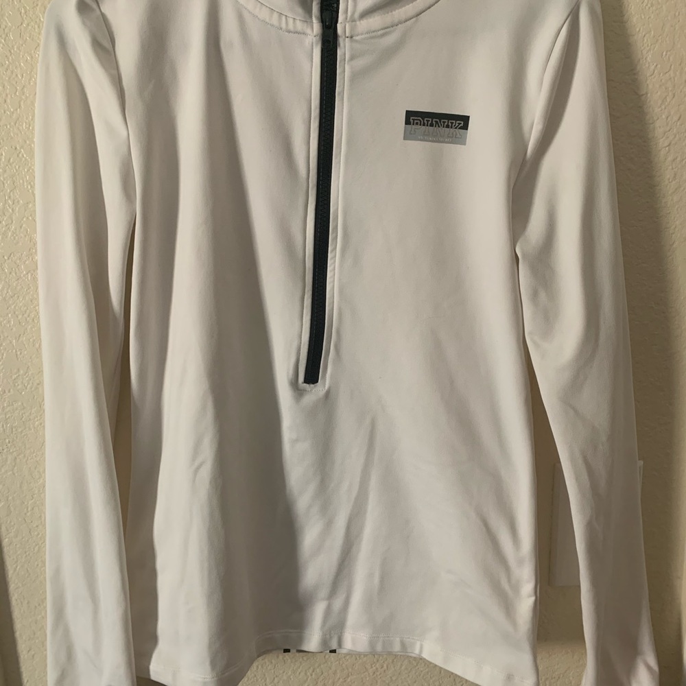 Pink sweater good condition no steins
